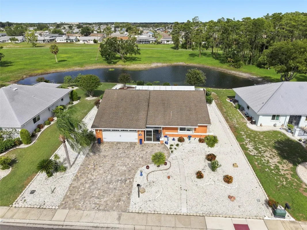 Property Slideshow image 1 of 50 | 1002 el rancho dr, Sun City Center, FL, 33573