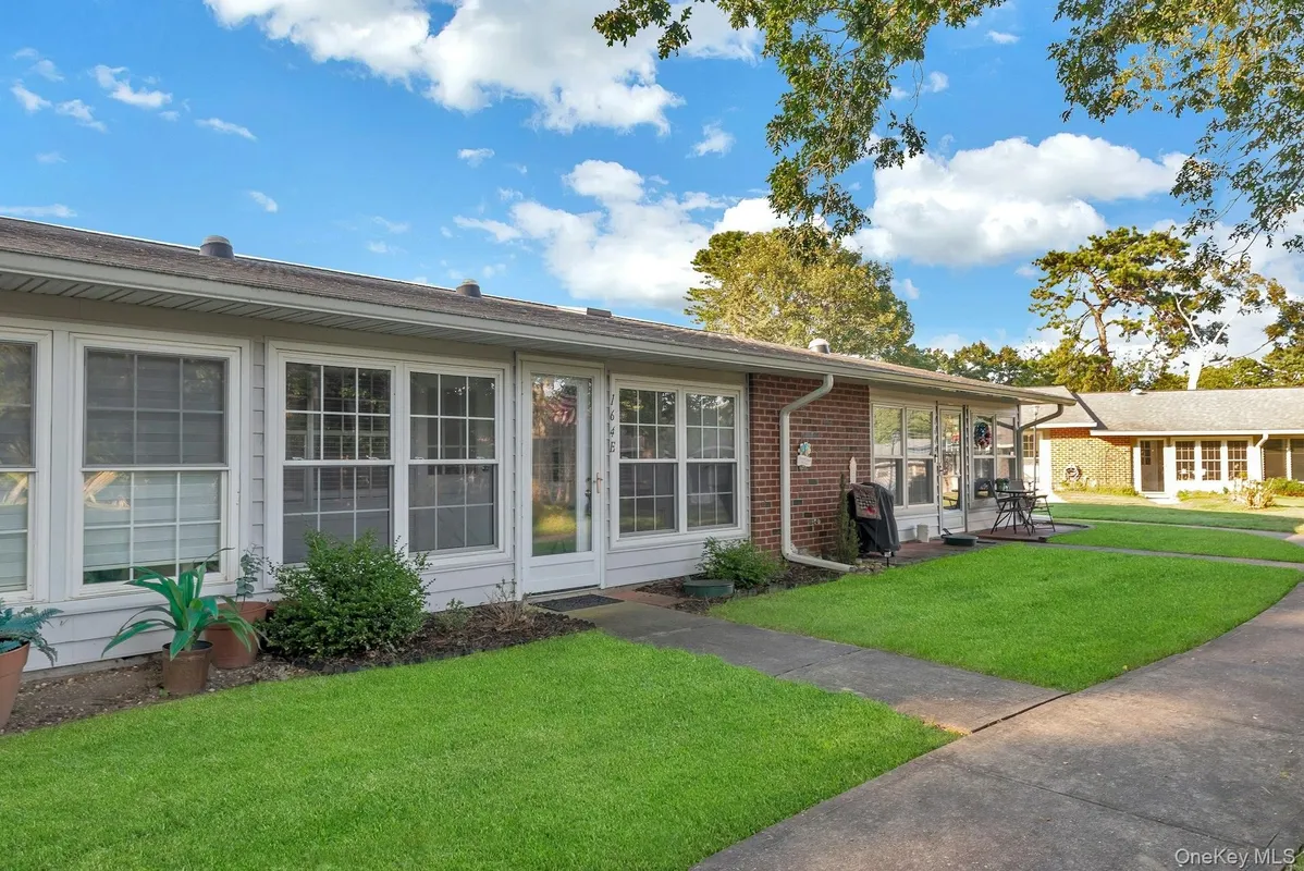 Property Slideshow image 1 of 15 | 164 falmouth ct e, Ridge, NY, 11961