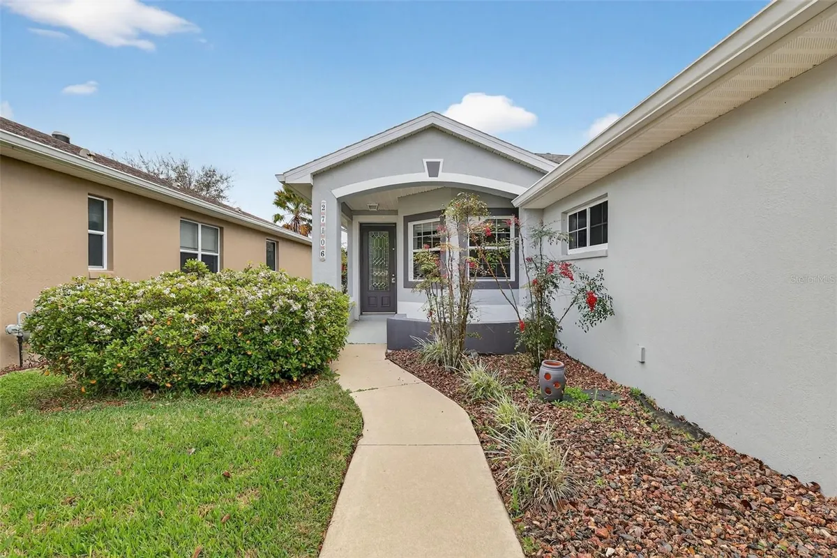 Property Slideshow image 1 of 40 | 27106 greenfly orchid ln, Leesburg, FL, 34748