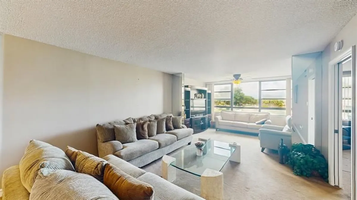 Property Slideshow image 1 of 27 | 10352 e clairmont cir 311, Tamarac, FL, 33321