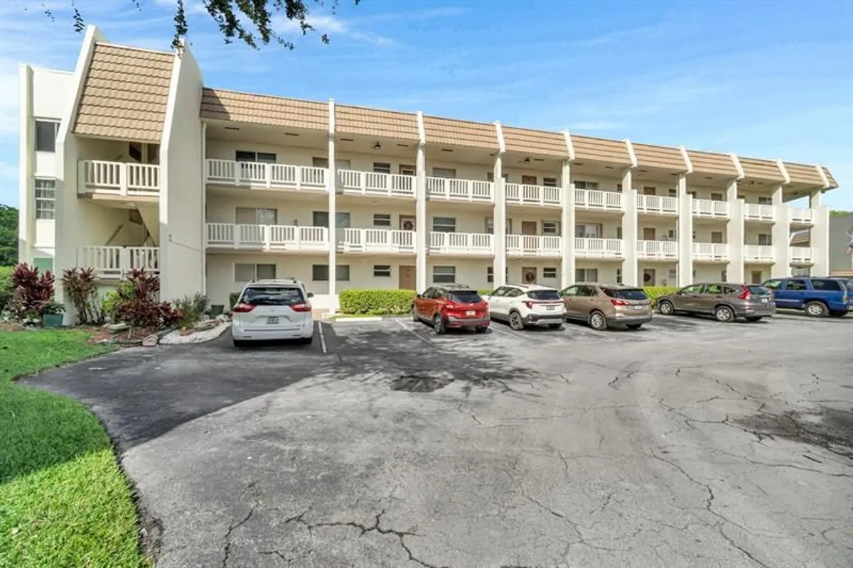 Property Slideshow image 1 of 38 | 6890 royal palm blvd 203h, Margate, FL, 33063