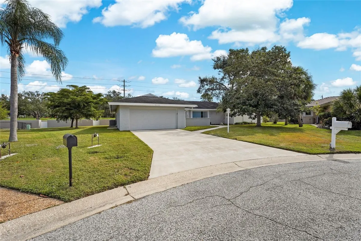 Property Slideshow image 1 of 57 | 5720 timber lake cir, Sarasota, FL, 34243