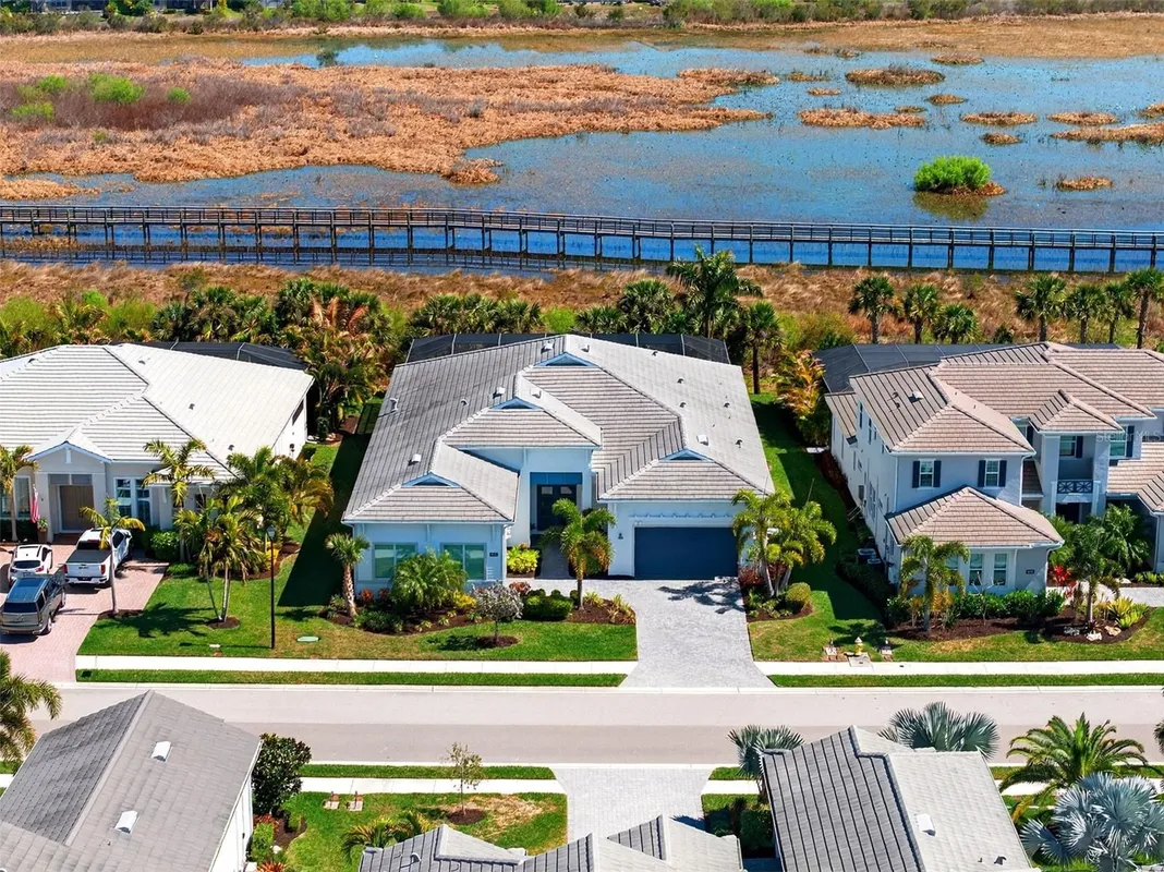 Property Slideshow image 1 of 90 | 8276 redonda loop, Lakewood Ranch, FL, 34202