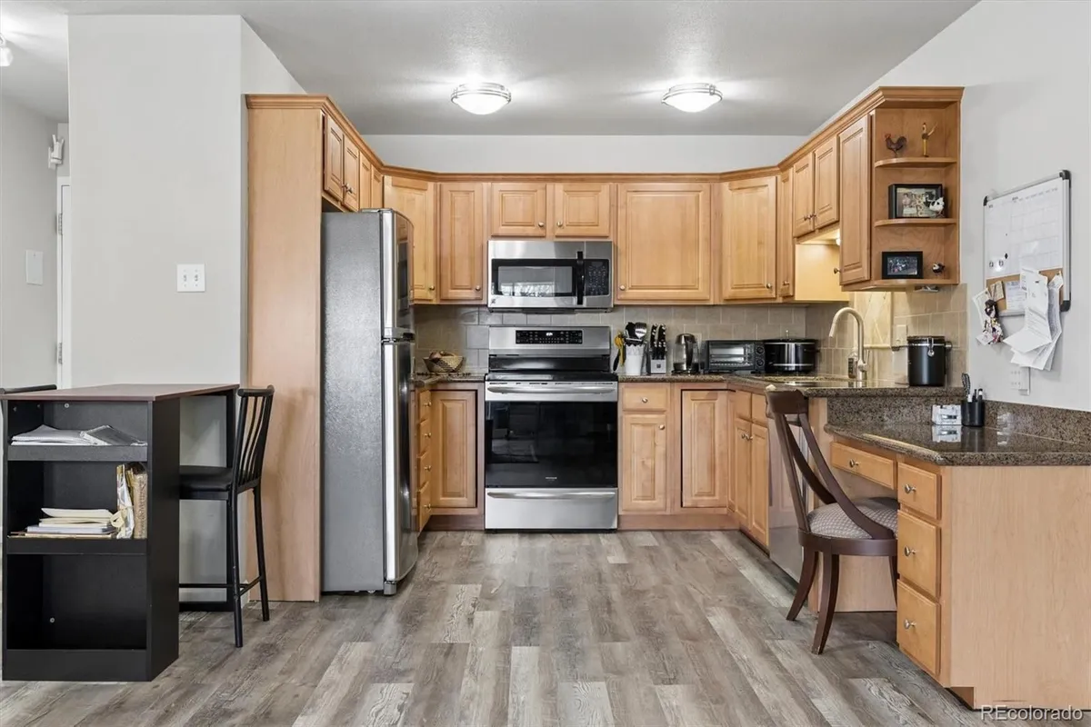 Property Slideshow image 1 of 42 | 9385 e center ave 12d, Denver, CO, 80247