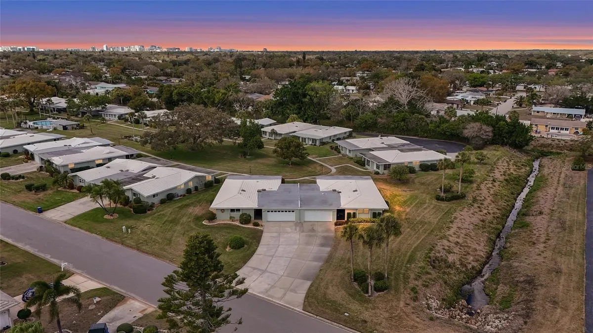 Property Slideshow image 1 of 53 | 3206 village green dr 1036, Sarasota, FL, 34239