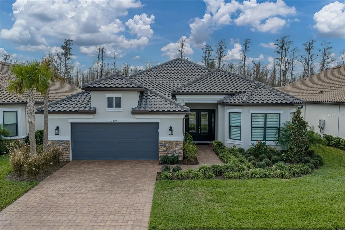 Property Slideshow image 1 of 79 | 4920 freccia loop, Wesley Chapel, FL, 33543