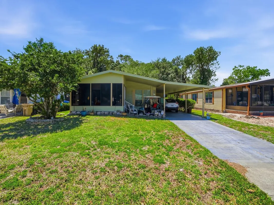 Property Slideshow image 1 of 19 | 320 westwood dr, Leesburg, FL, 34748