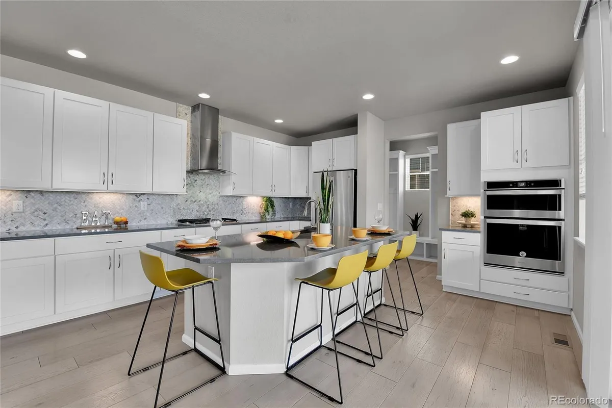 Property Slideshow image 1 of 9 | 6841 w asbury pl, Lakewood, CO, 80227