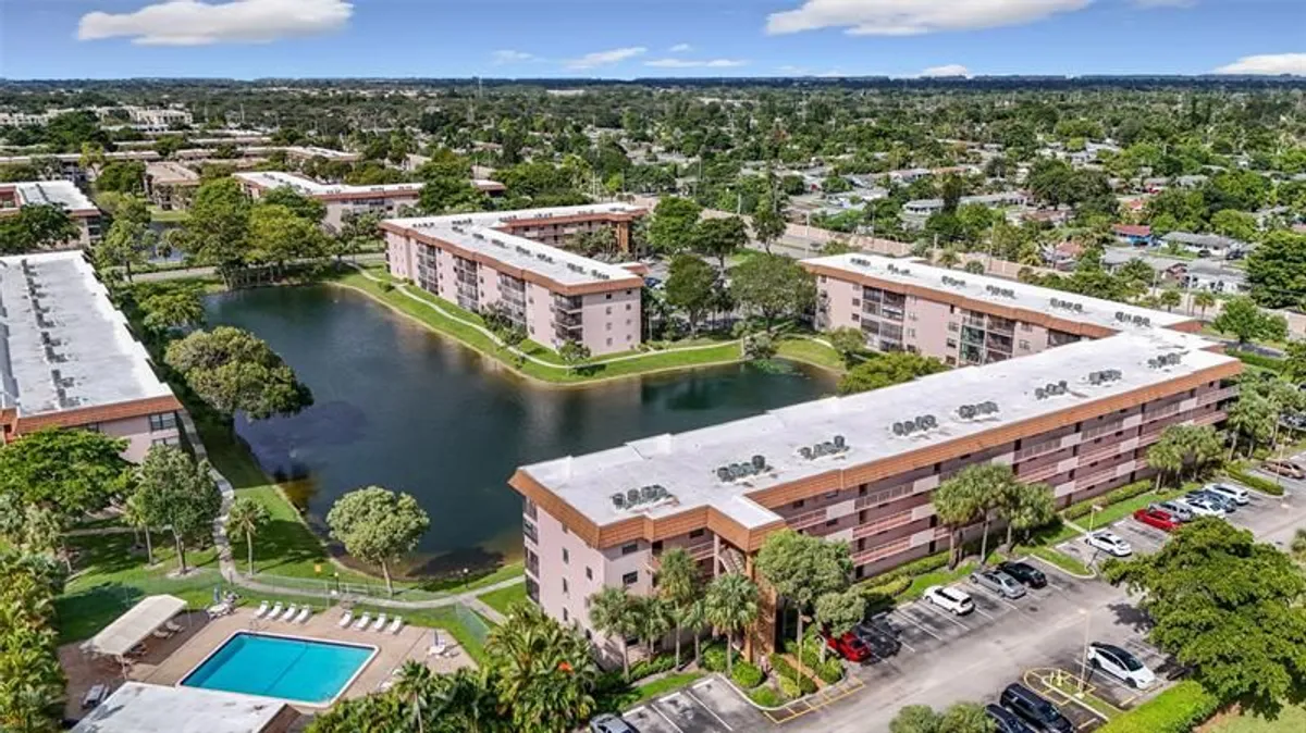 Property Slideshow image 1 of 62 | 4930 e sabal palm blvd 301, Tamarac, FL, 33319