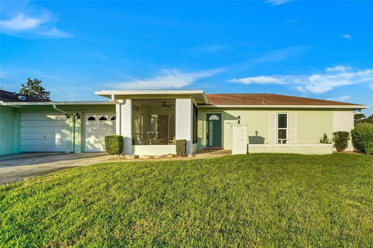 Property Slideshow image 1 of 18 | 11340 dollar lake dr 2, Port Richey, FL, 34668