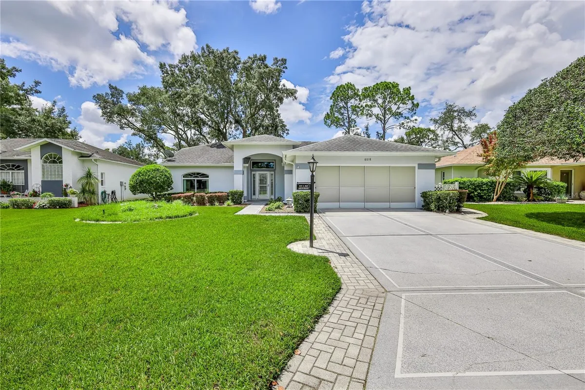 Property Slideshow image 1 of 70 | 8018 sugarbush dr, Spring Hill, FL, 34606