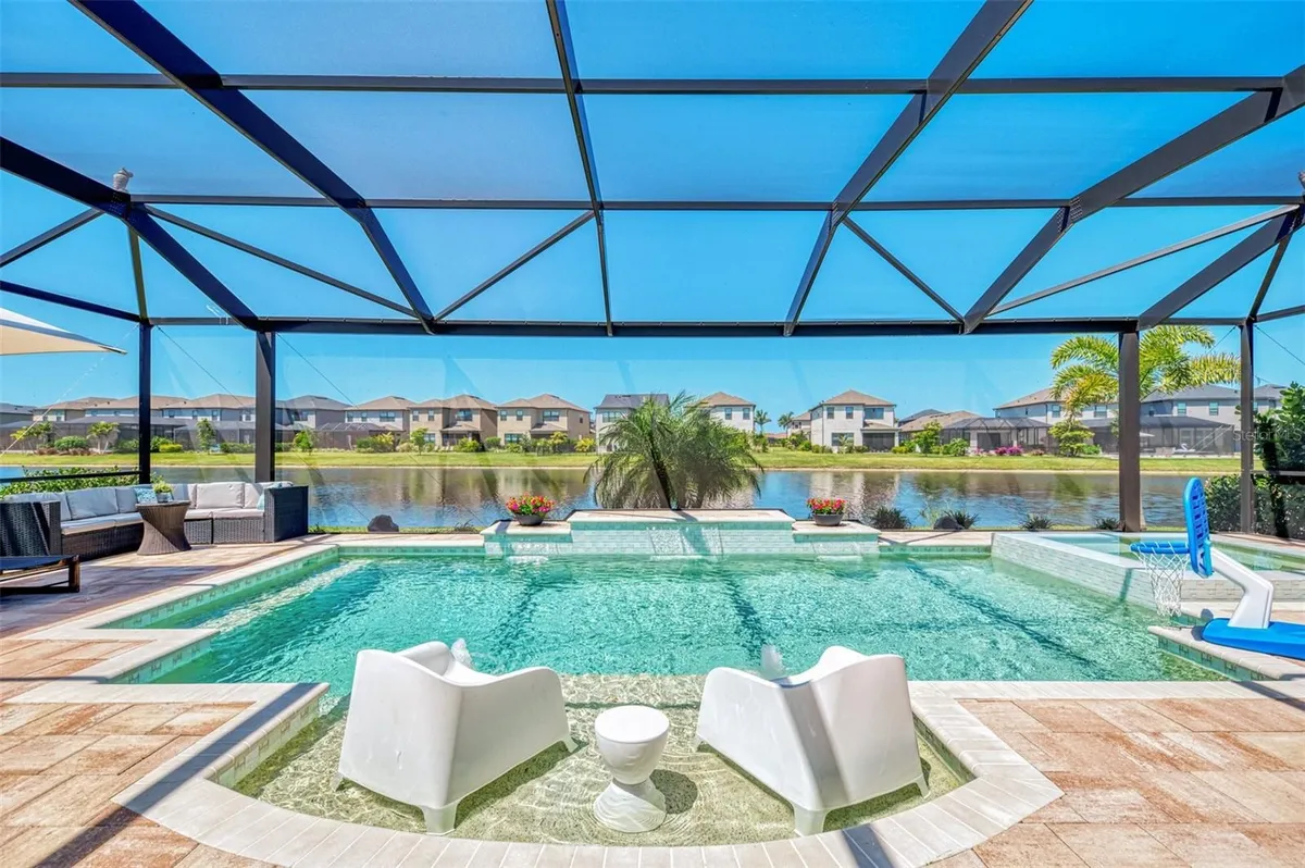 Property Slideshow image 1 of 69 | 10192 milky way cir, Sarasota, FL, 34241