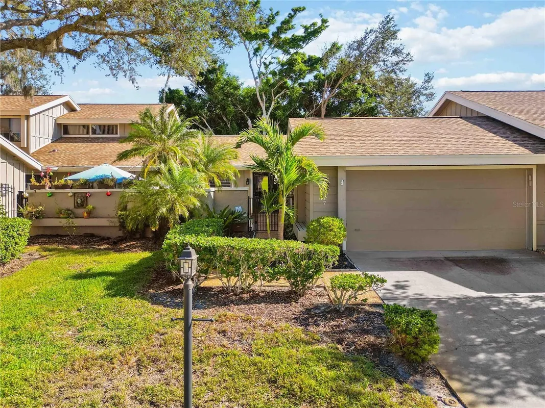 Property Slideshow image 1 of 41 | 4617 forest wood trl # 8, Sarasota, FL, 34241