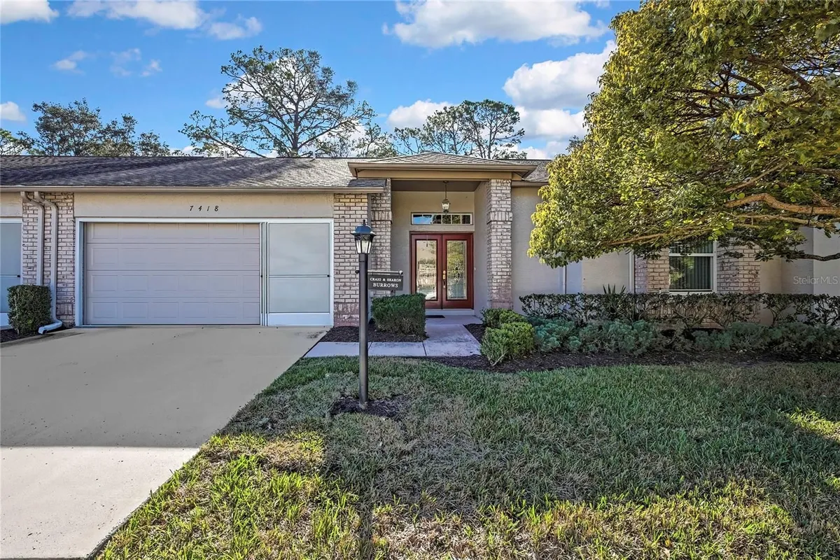 Property Slideshow image 1 of 38 | 7418 baywood forest cir, Spring Hill, FL, 34606