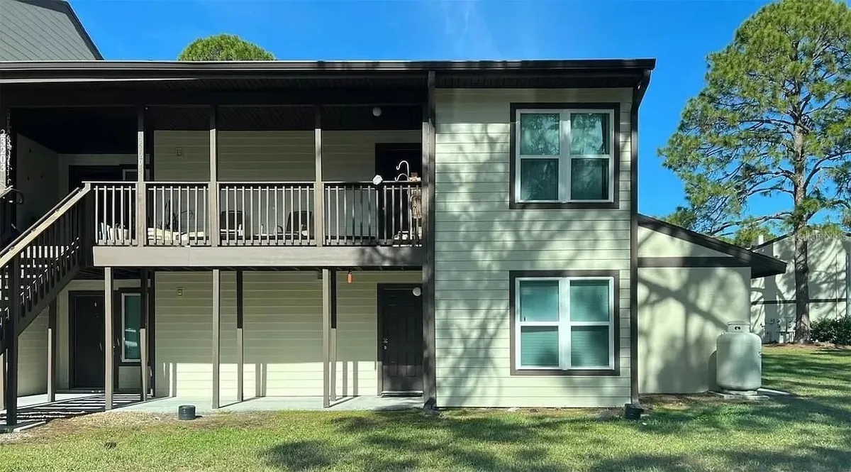 Property Slideshow image 1 of 9 | 23104 sandalwood dr 104, Wildwood, FL, 34785