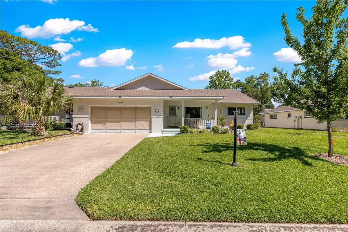 Property Slideshow image 1 of 52 | 8671 sw 97th st g, Ocala, FL, 34481