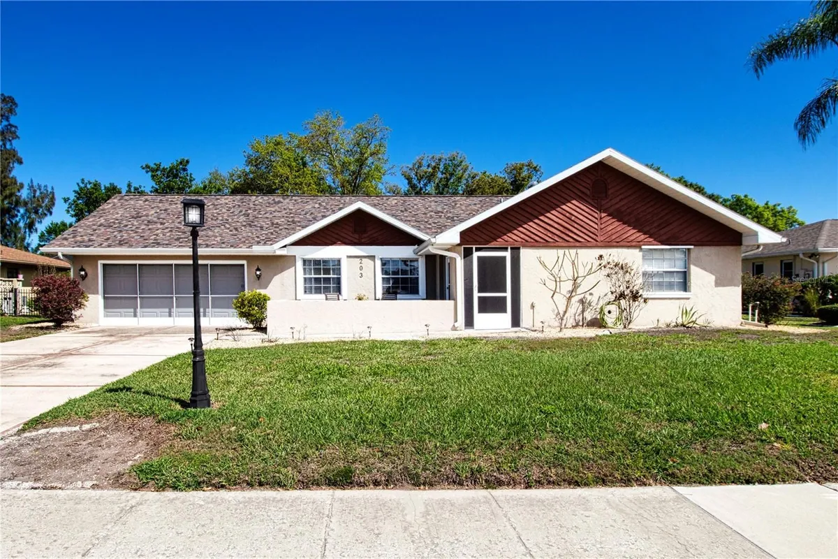 Property Slideshow image 1 of 66 | 203 amesbury cir, Sun City Center, FL, 33573