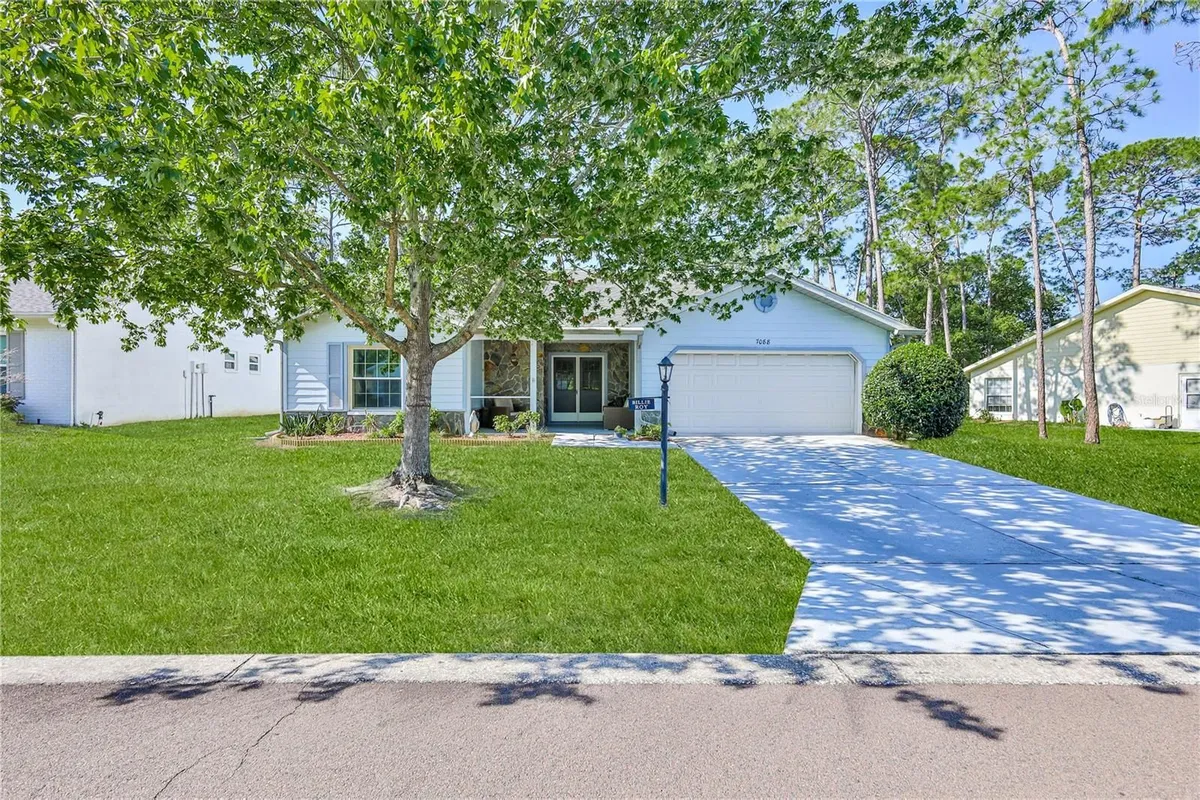 Property Slideshow image 1 of 59 | 7088 crown oaks dr, Spring Hill, FL, 34606