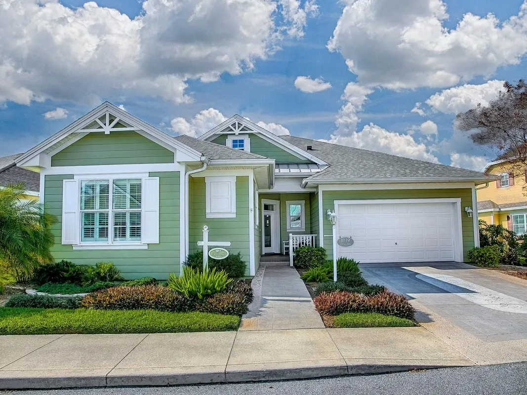 Property Slideshow image 1 of 50 | 1039 cottage dr, The Villages, FL, 32162