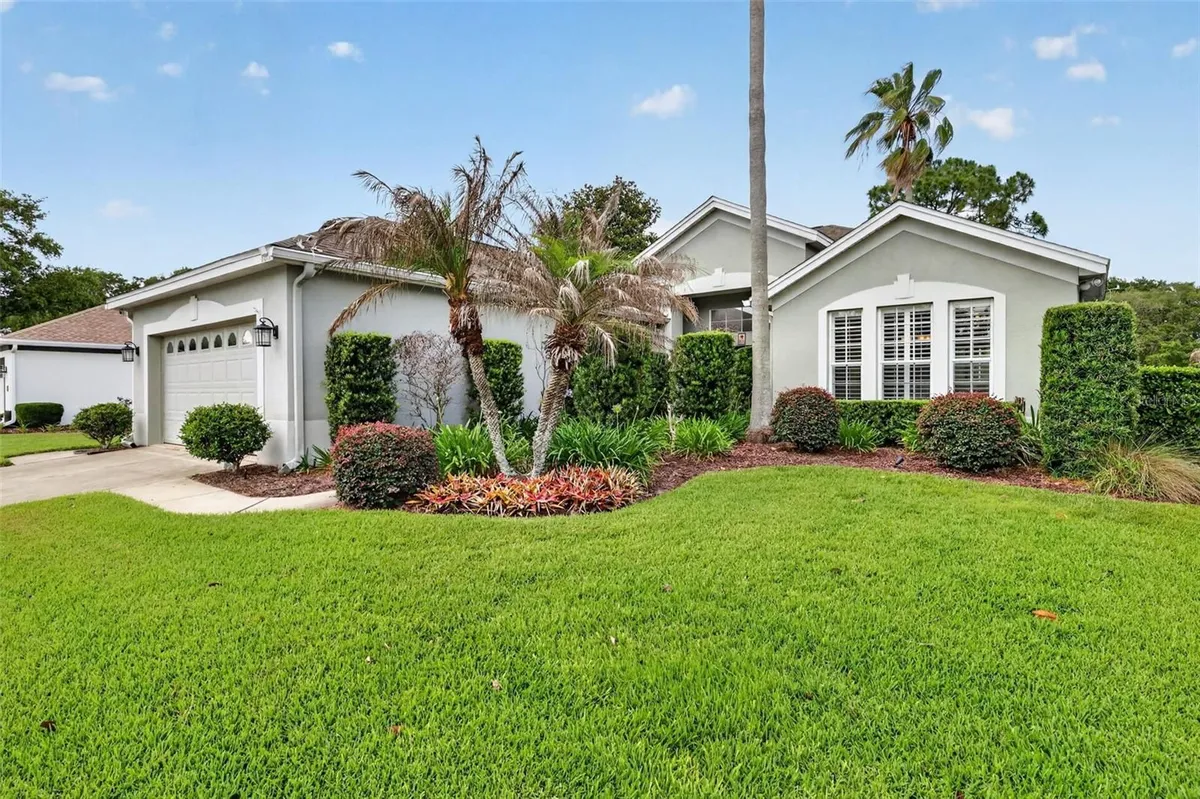 Property Slideshow image 1 of 56 | 8011 pine hollow dr, Mount Dora, FL, 32757