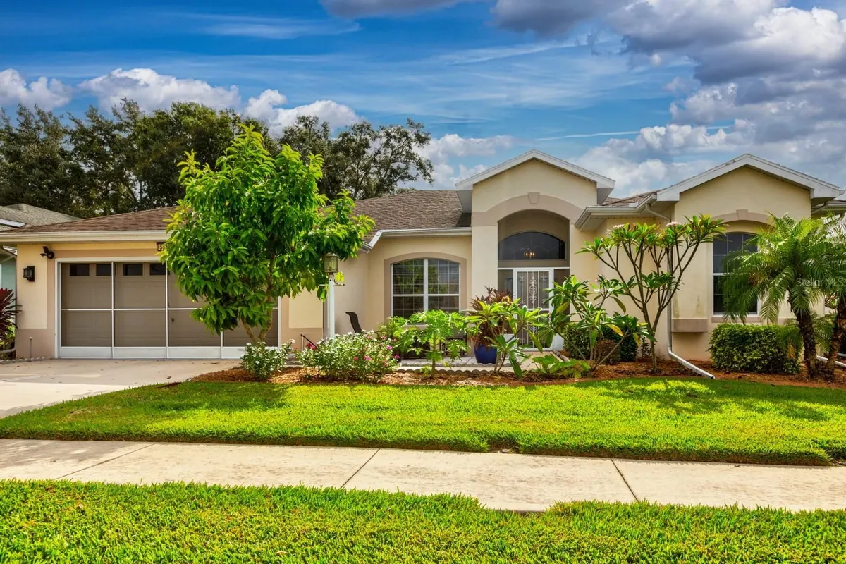 Property Slideshow image 1 of 24 | 5839 woodland moss way, Leesburg, FL, 34748