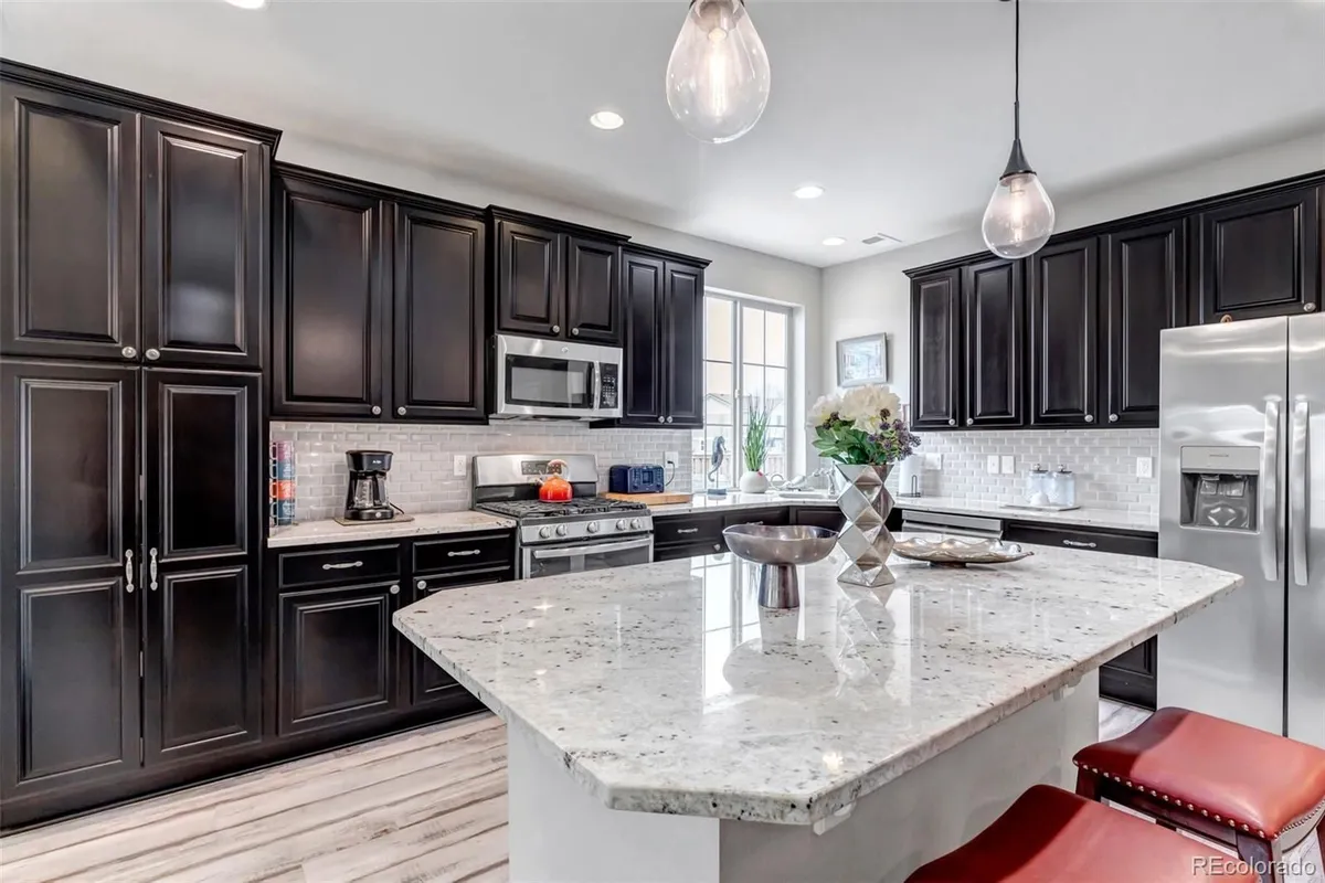 Property Slideshow image 1 of 50 | 5519 genoa st, Denver, CO, 80249