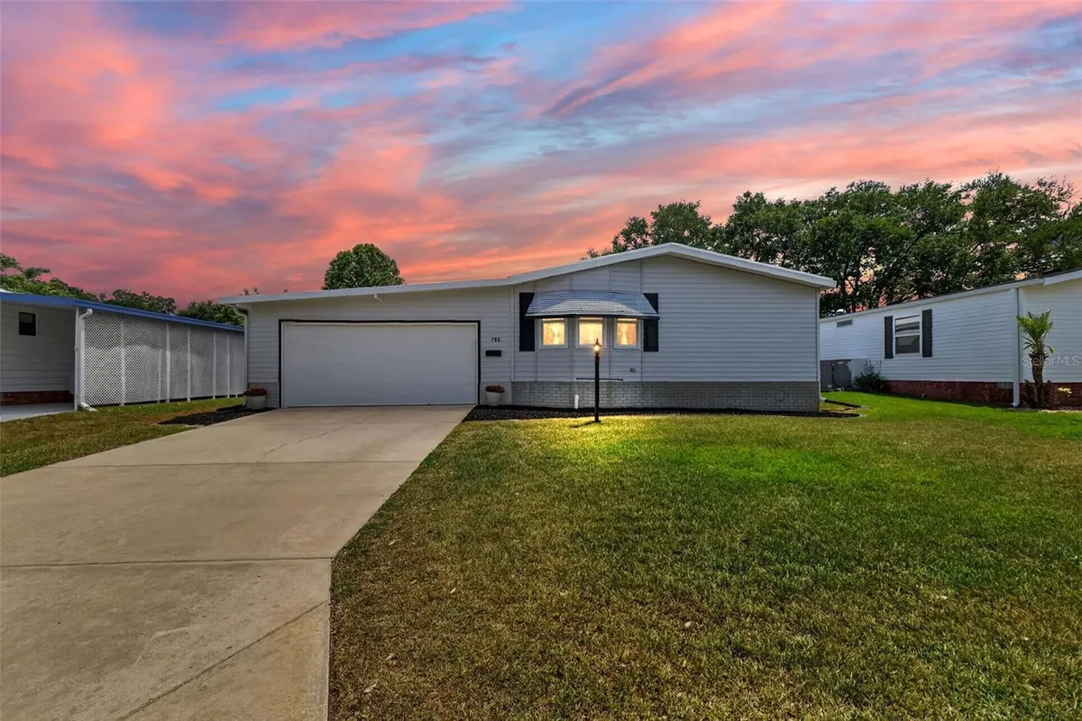 Property Slideshow image 1 of 44 | 706 tangerine dr, Lady Lake, FL, 32159