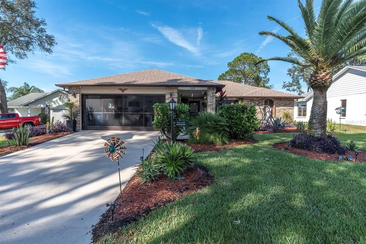 Property Slideshow image 1 of 64 | 7099 pond view ct, Spring Hill, FL, 34606