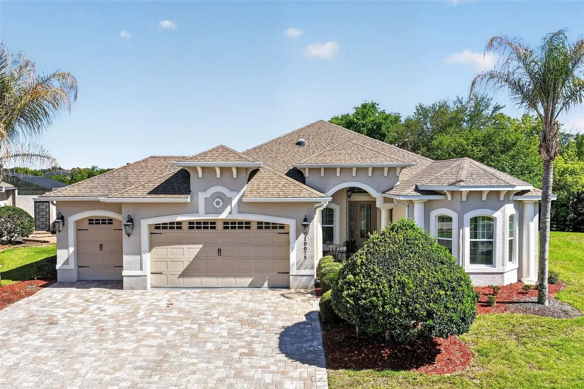 Property Slideshow image 1 of 52 | 10075 lake miona way, Oxford, FL, 34484