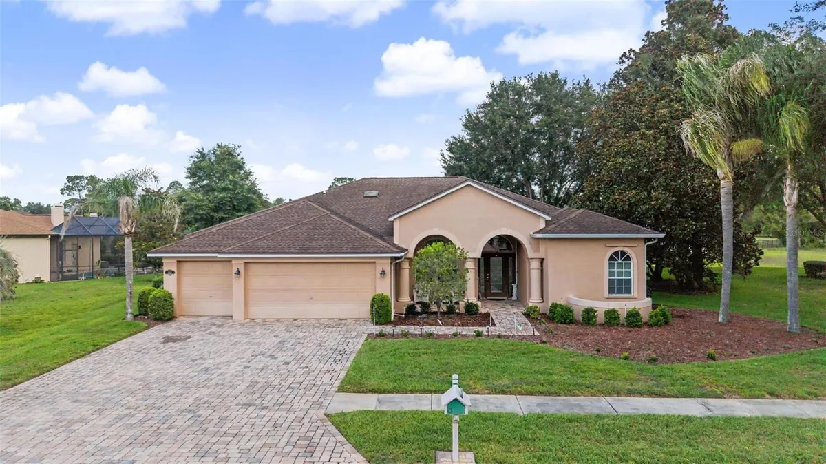 Property Slideshow image 1 of 39 | 5183 golf club ln, Spring Hill, FL, 34609