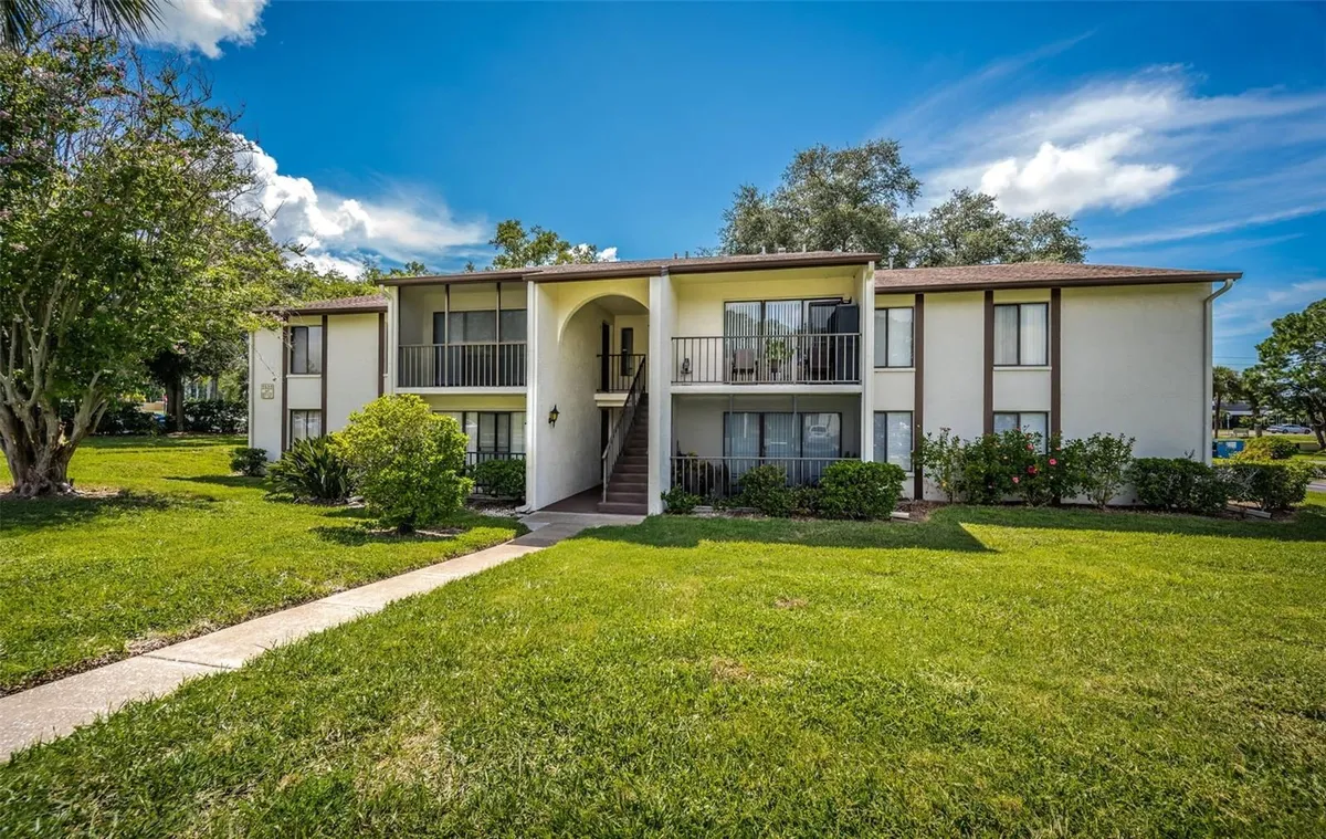 Property Slideshow image 1 of 34 | 2522 pine ridge way a2, Palm Harbor, FL, 34684