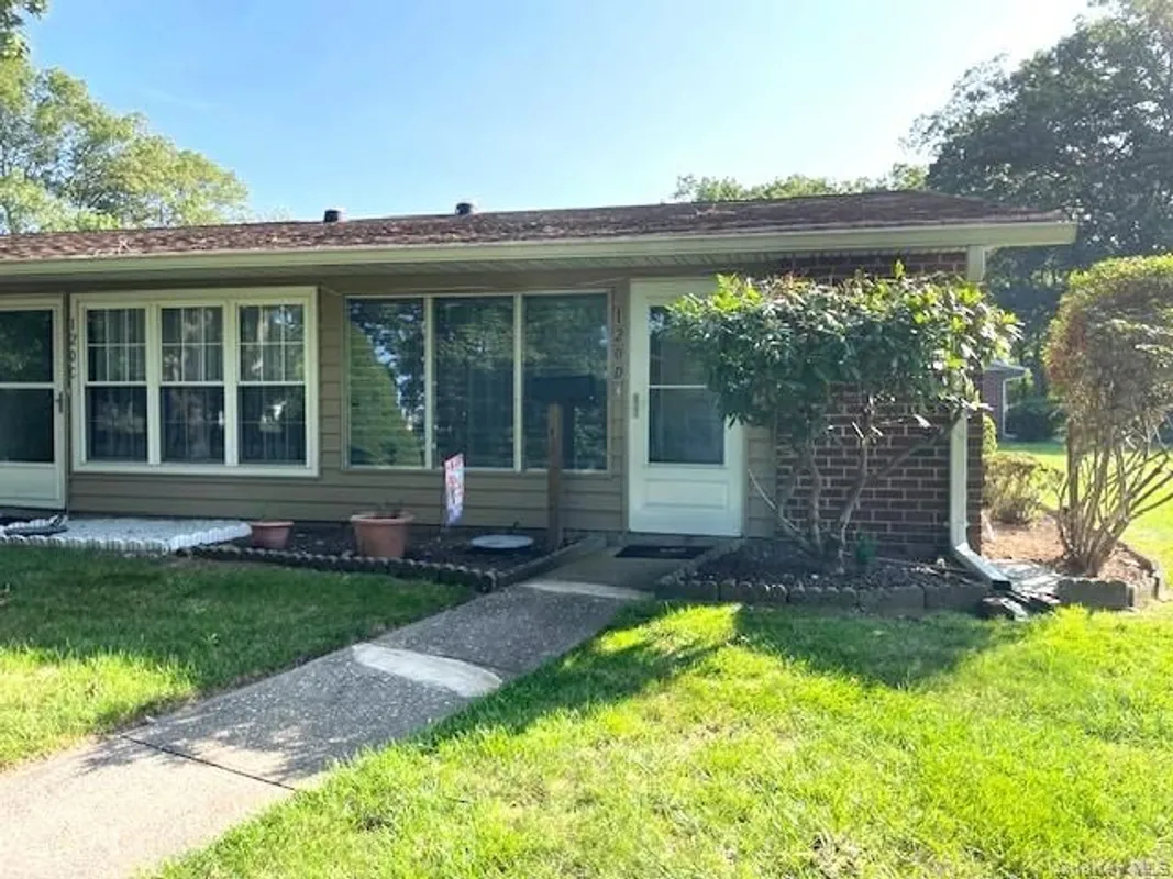 Property Slideshow image 1 of 14 | 120 exmore ct d, Ridge, NY, 11961