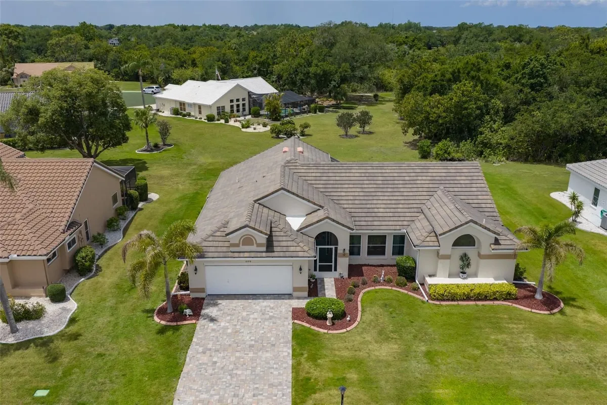 Property Slideshow image 1 of 43 | 2109 new bedford dr, Sun City Center, FL, 33573