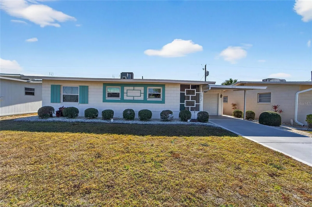 Property Slideshow image 1 of 53 | 1512 chevy chase dr, Sun City Center, FL, 33573