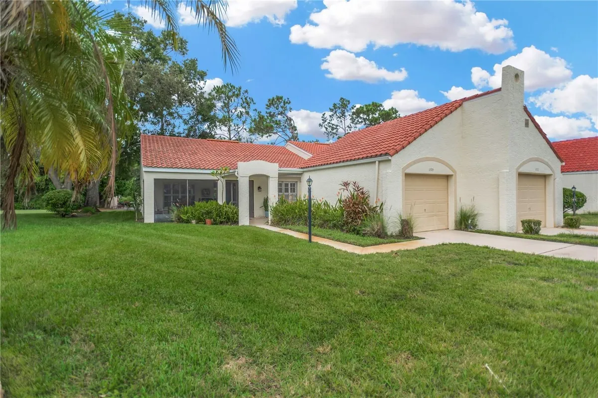Property Slideshow image 1 of 26 | 1090 seville dr 29, Palm Harbor, FL, 34684