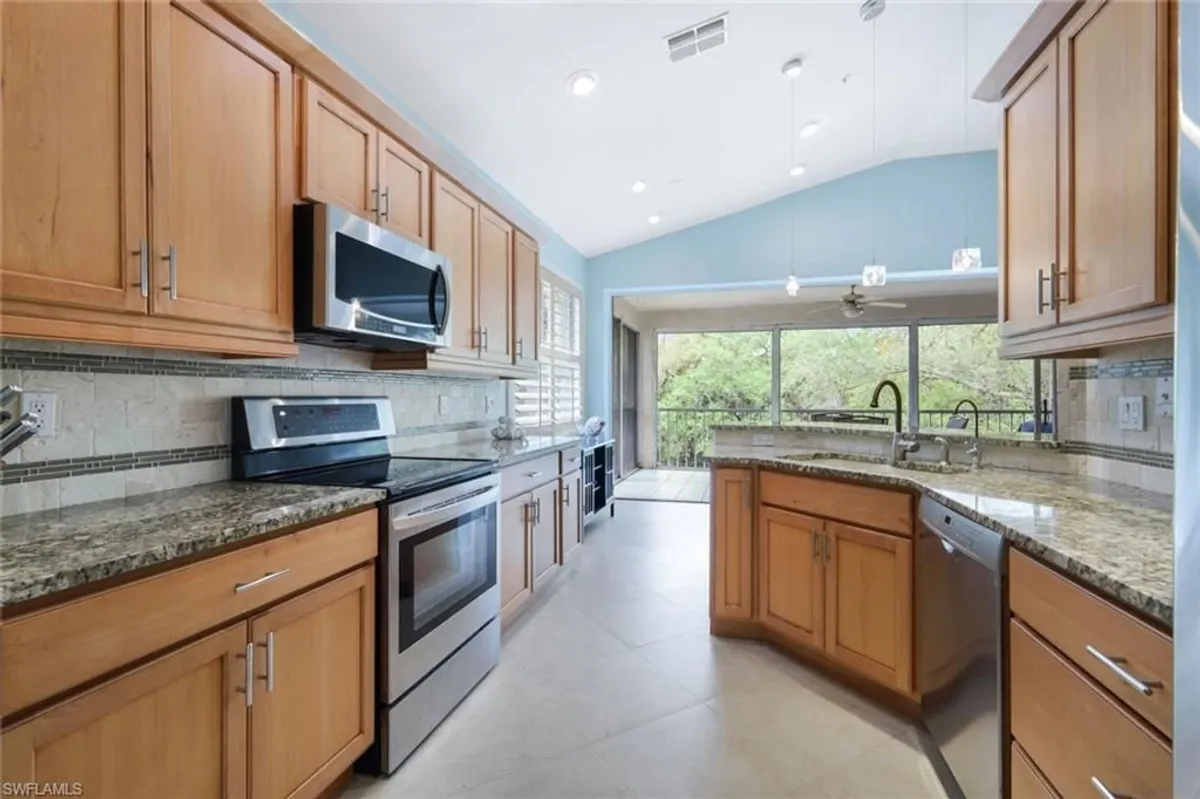 Property Slideshow image 1 of 20 | 25208 pelican creek cir 201, Bonita Springs, FL, 34134