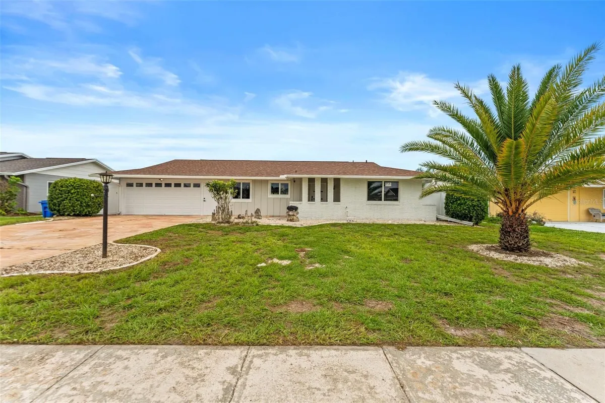 Property Slideshow image 1 of 48 | 1406 seton hall dr, Sun City Center, FL, 33573