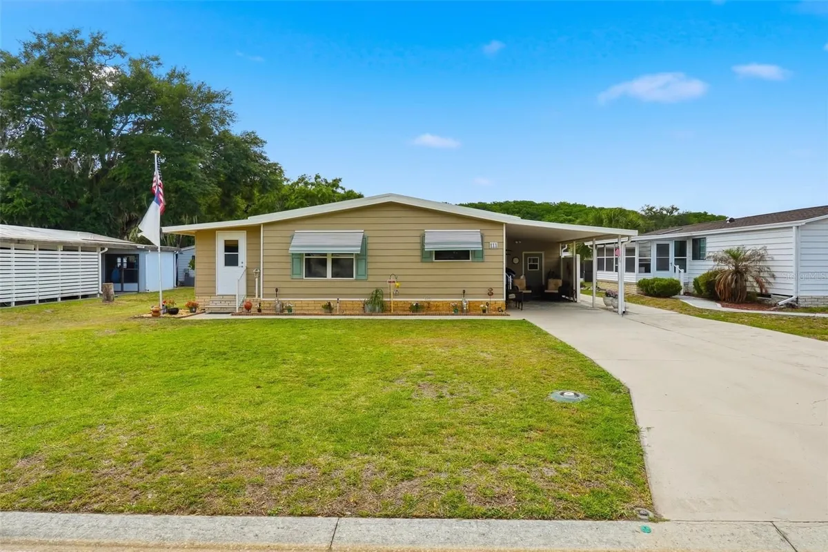Property Slideshow image 1 of 27 | 111 winterberry ave, Wildwood, FL, 34785