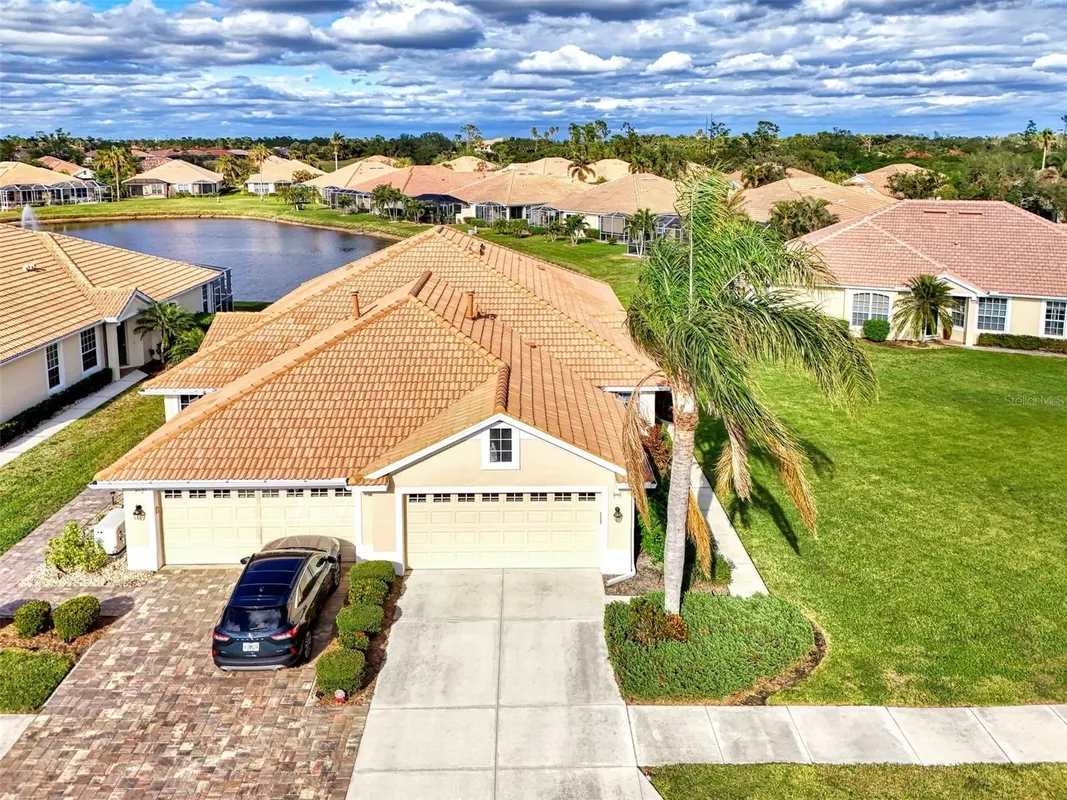Property Slideshow image 1 of 48 | 4980 whispering oaks dr, North Port, FL, 34287