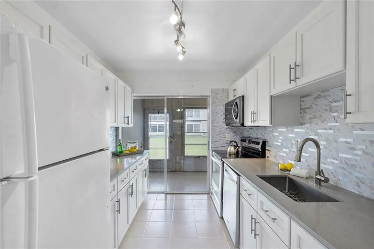 Property Slideshow image 1 of 26 | 7500 nw 5th ct apt 104, Margate, FL, 33063