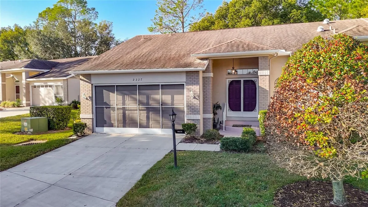 Property Slideshow image 1 of 26 | 2337 hidden trail dr, Spring Hill, FL, 34606