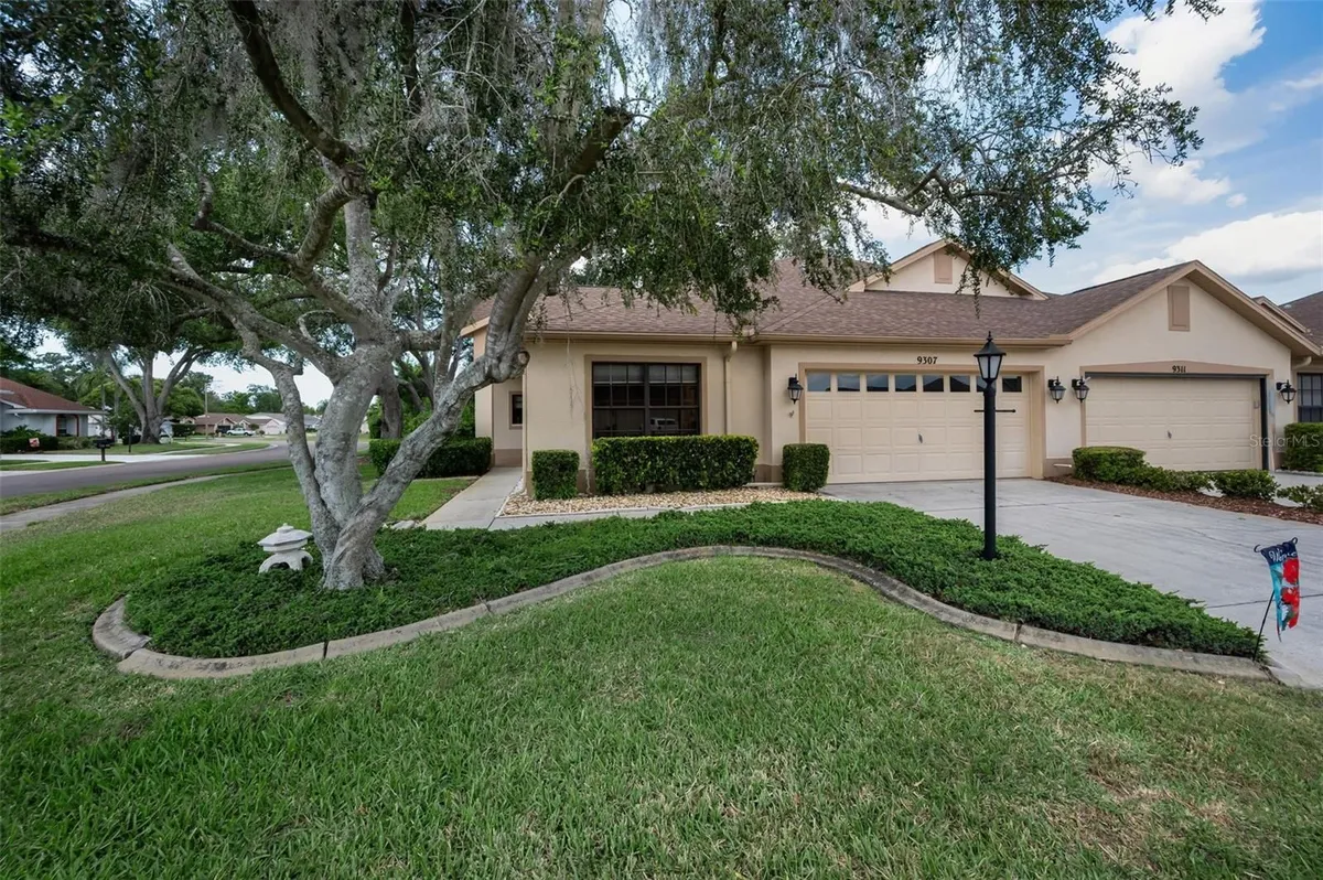 Property Slideshow image 1 of 61 | 9307 palm haven ct, New Port Richey, FL, 34655