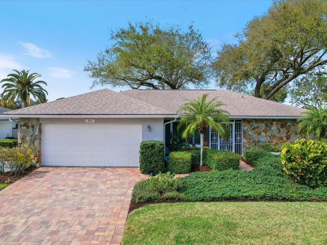 Property Slideshow image 1 of 69 | 984 gillespie dr, Palm Harbor, FL, 34684