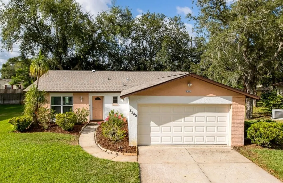 Property Slideshow image 1 of 38 | 8240 winding wood dr, Port Richey, FL, 34668