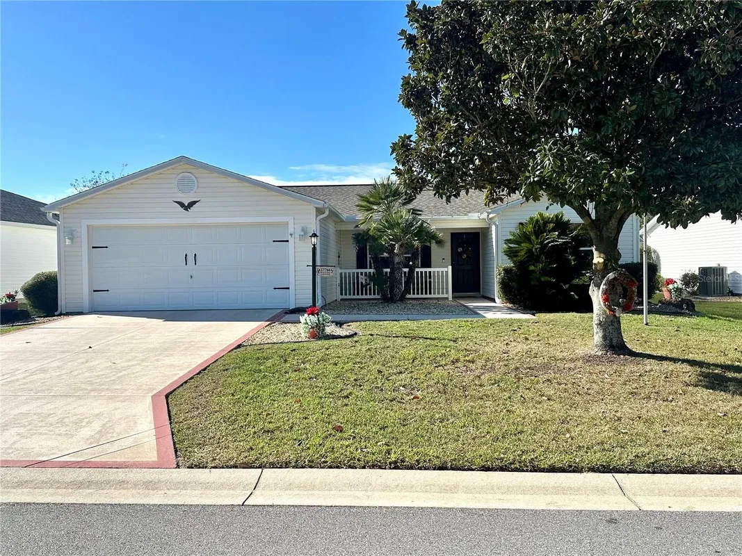 Property Slideshow image 1 of 23 | 17766 se 91st poplar ter, The Villages, FL, 32162