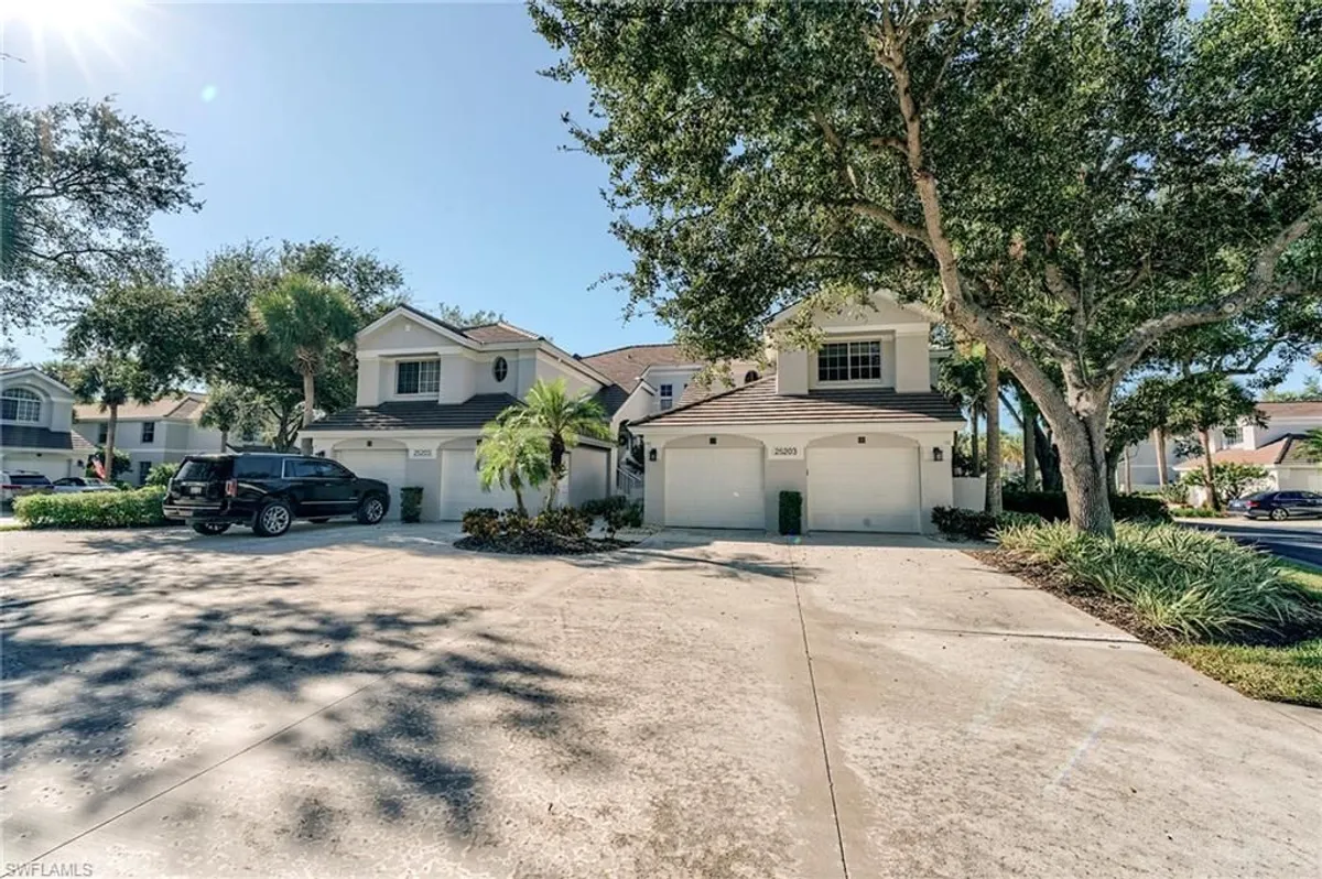 Property Slideshow image 1 of 35 | 25203 pelican creek cir 102, Bonita Springs, FL, 34134
