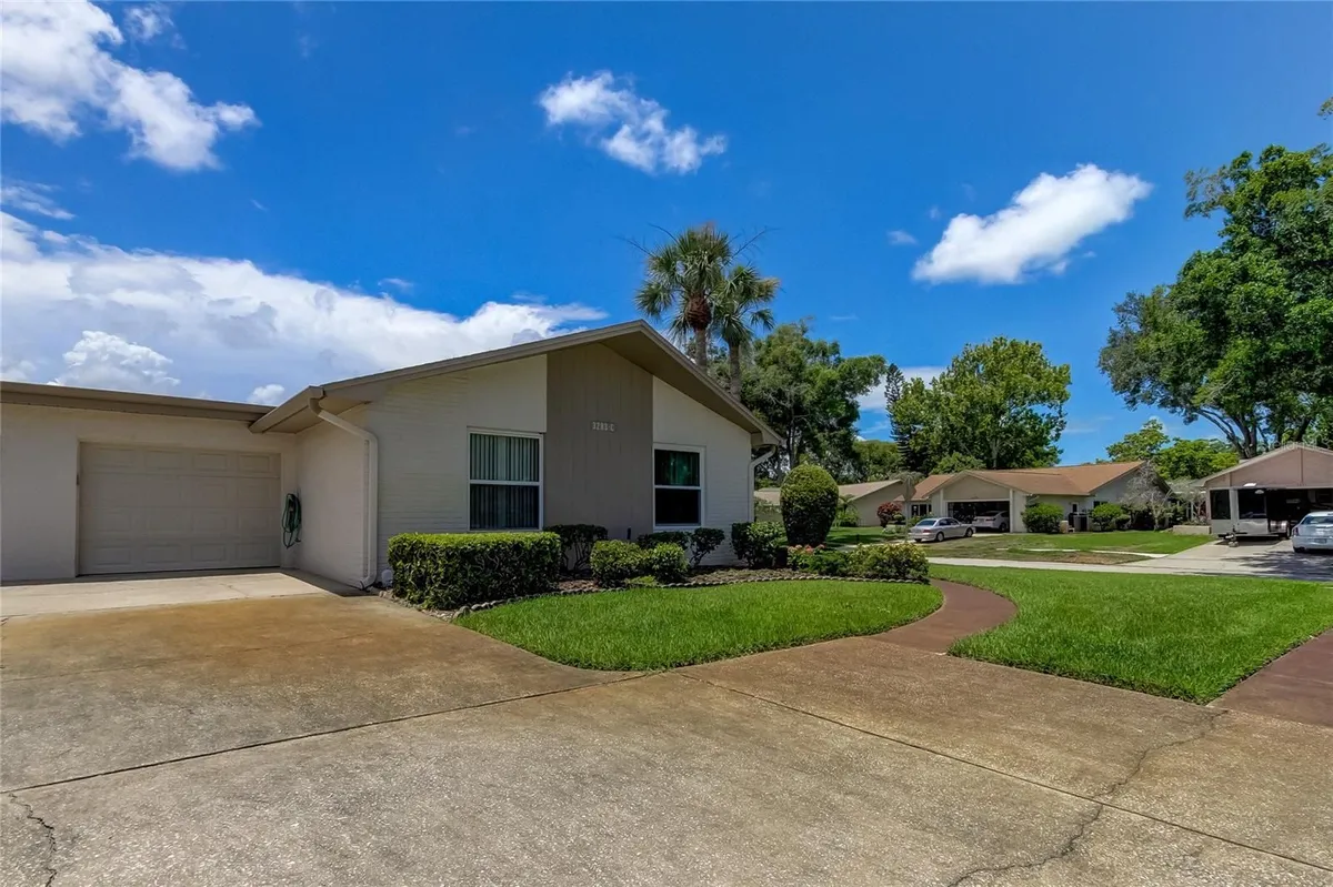 Property Slideshow image 1 of 44 | 3283 hilary cir 2c, Palm Harbor, FL, 34684