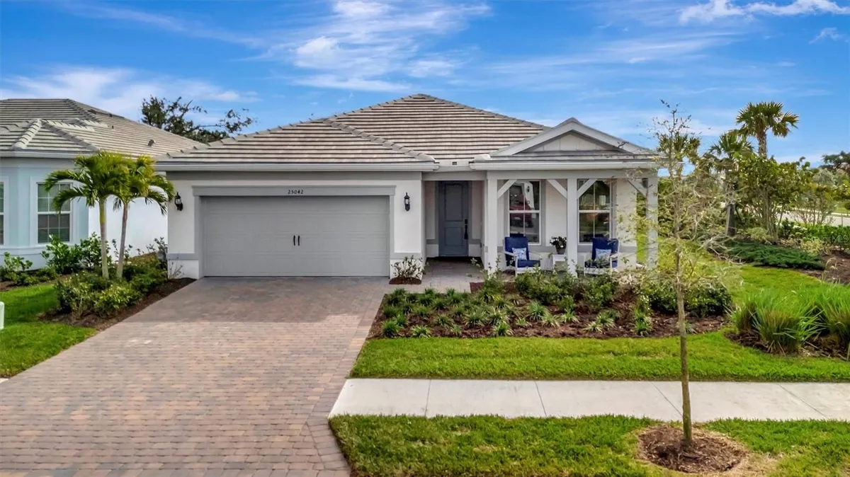 Property Slideshow image 1 of 61 | 25042 coquina ridge way, Englewood, FL, 34223