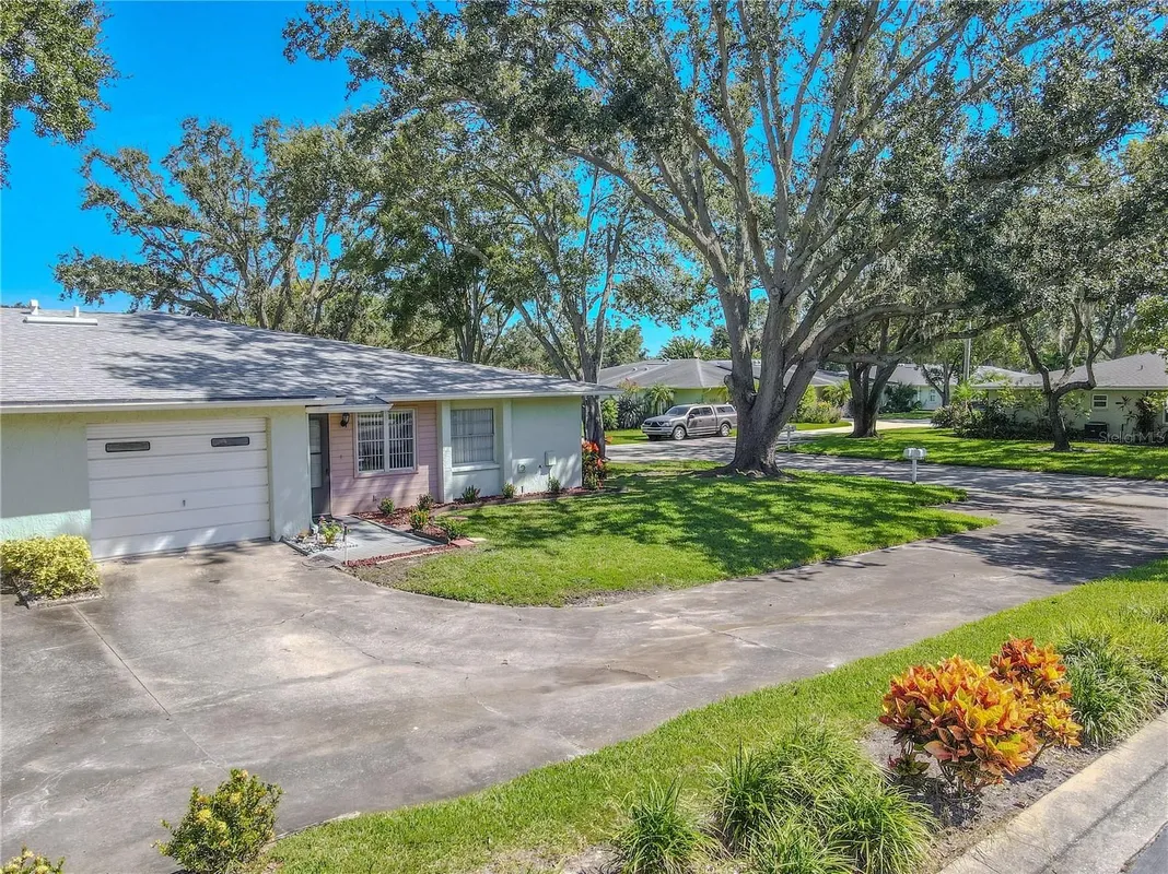 Property Slideshow image 1 of 28 | 1131 orange tree cir c, Palm Harbor, FL, 34684