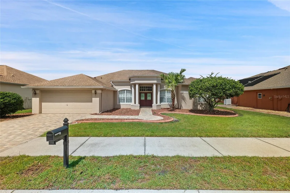 Property Slideshow image 1 of 26 | 7154 melogold cir, Land O Lakes, FL, 34637